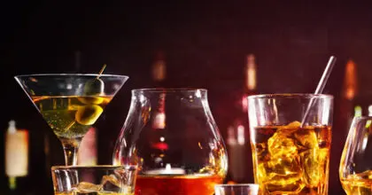 Assortment of spirits in differently shaped glasses.