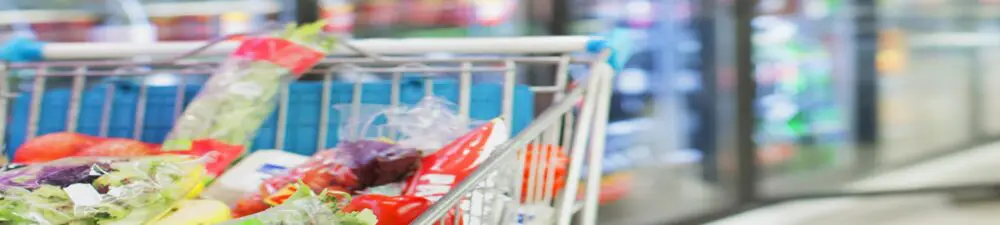 Shopping cart filled with groceries