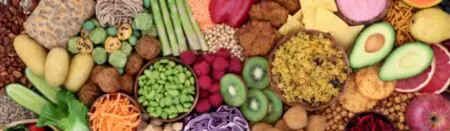 Specialised nutrition: a table filled with colourful fruit and vegetables.