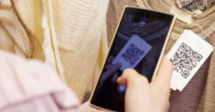 Woman scanning a Digital Product Passport