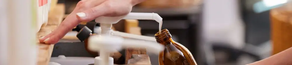 Sustainable refillable soap dispenser and bottle.