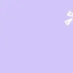 A hand holds a lit, yellow lightbulb against a purple background to signify innovation.