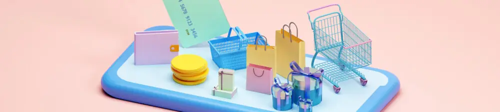 Smartphone mit Einkaufswagen und Shopping-Tüten.