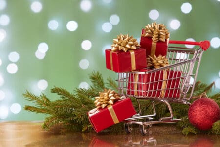 Red Christmas presents in a shopping cart
