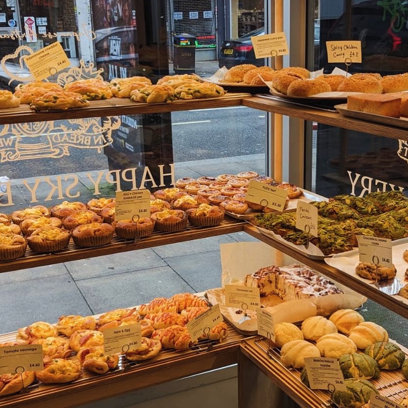 Image taken from inside Happy Sky Japanese Bakery in London, showing off all their baked goods on offer.