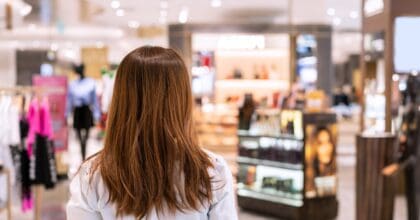 Experiential Retail Trends in Beauty: Women wanders around a beauty retail store.