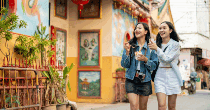 Two girls walking down the street in south East Asia